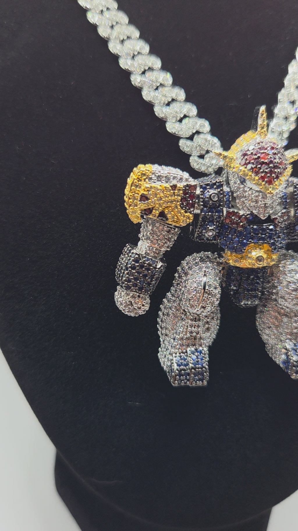 Iced out Gundam wing pendant on a 24 inch iced out chain