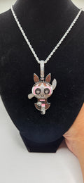 Iced out blossom powerpuff girl pendant on a 24 inch rope chain