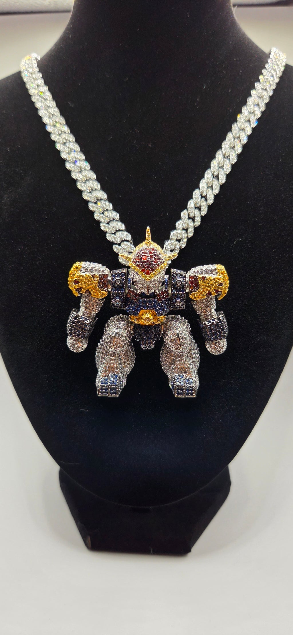 Iced out Gundam wing pendant on a 24 inch iced out chain