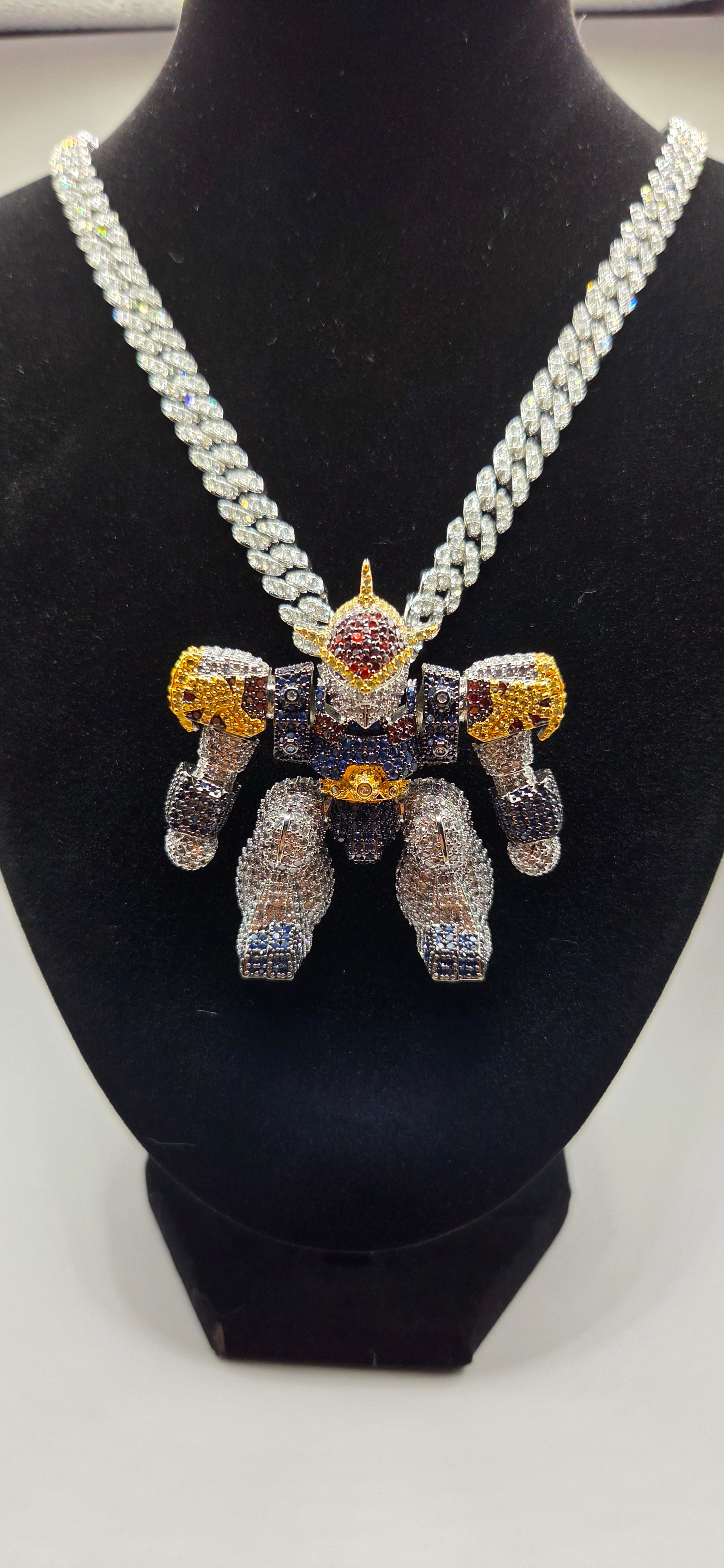 Iced out Gundam wing pendant on a 24 inch iced out chain