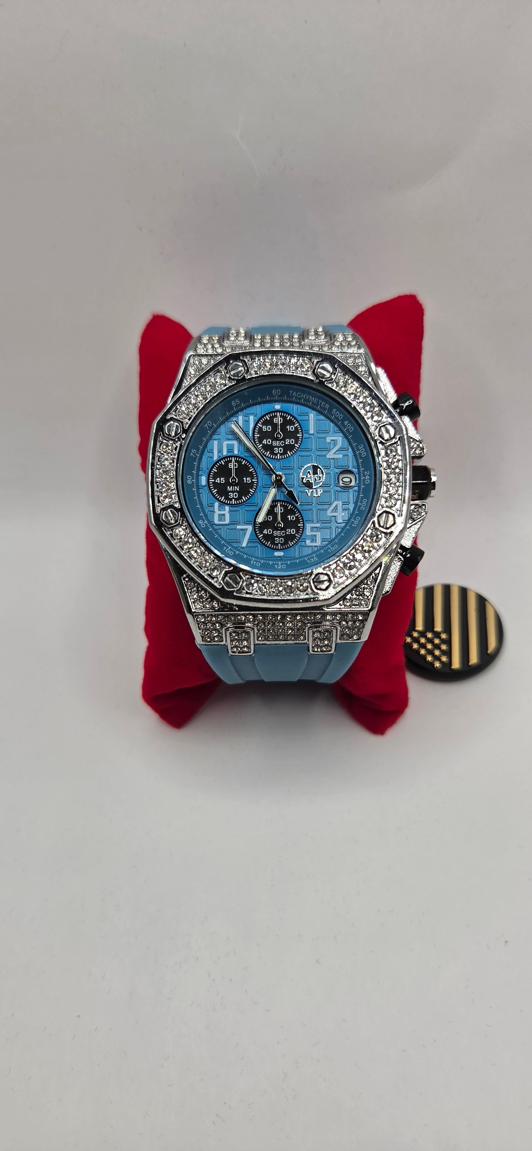 AJ Tiffany blue iced out Chrono master watch with a Tiffany blue rubber band