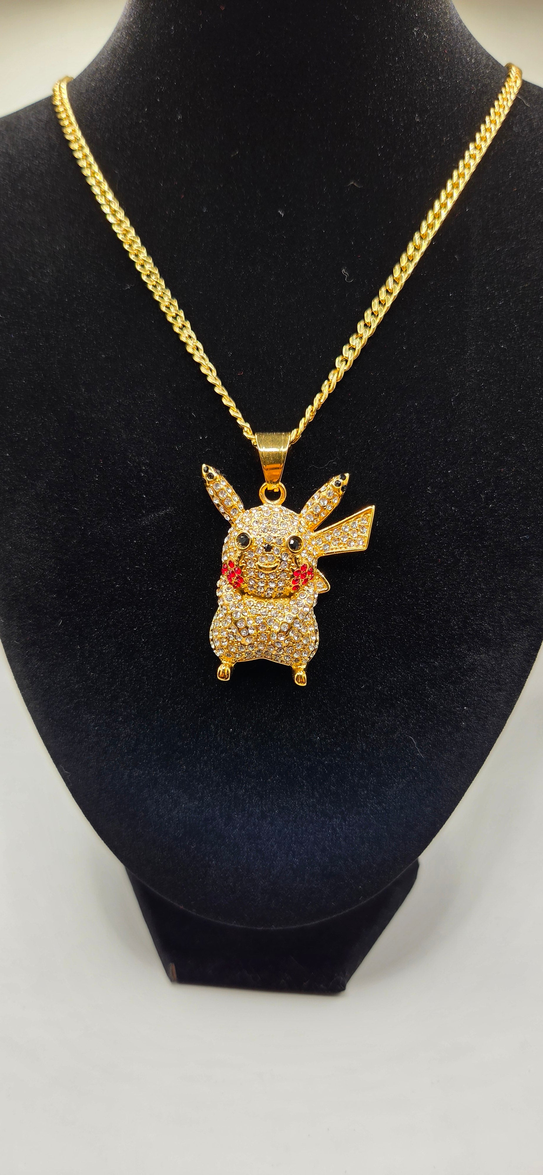 24 inch chain with a iced out Pikachu pendant