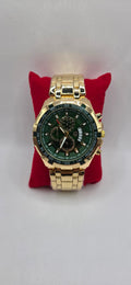 Gold and green AJ time master watch