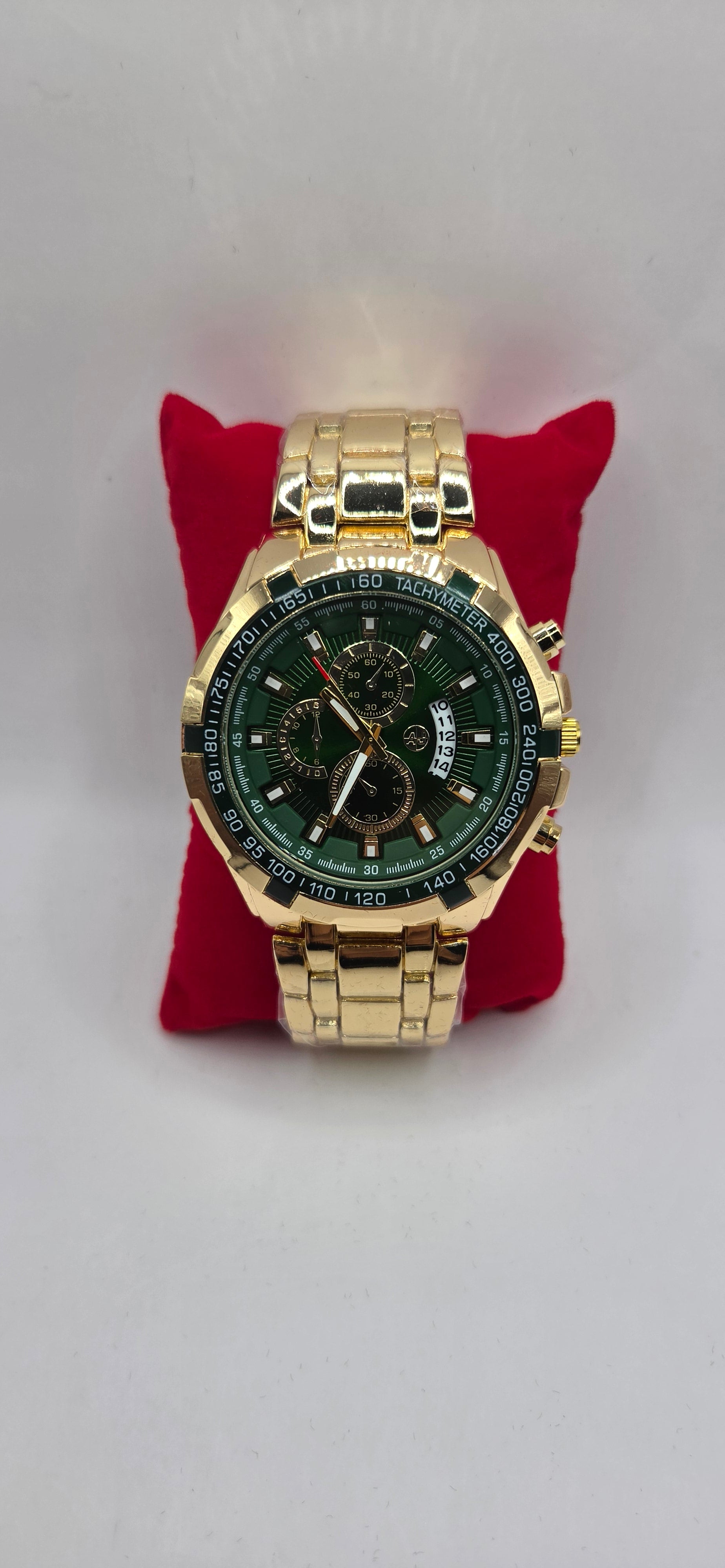 Gold and green AJ time master watch