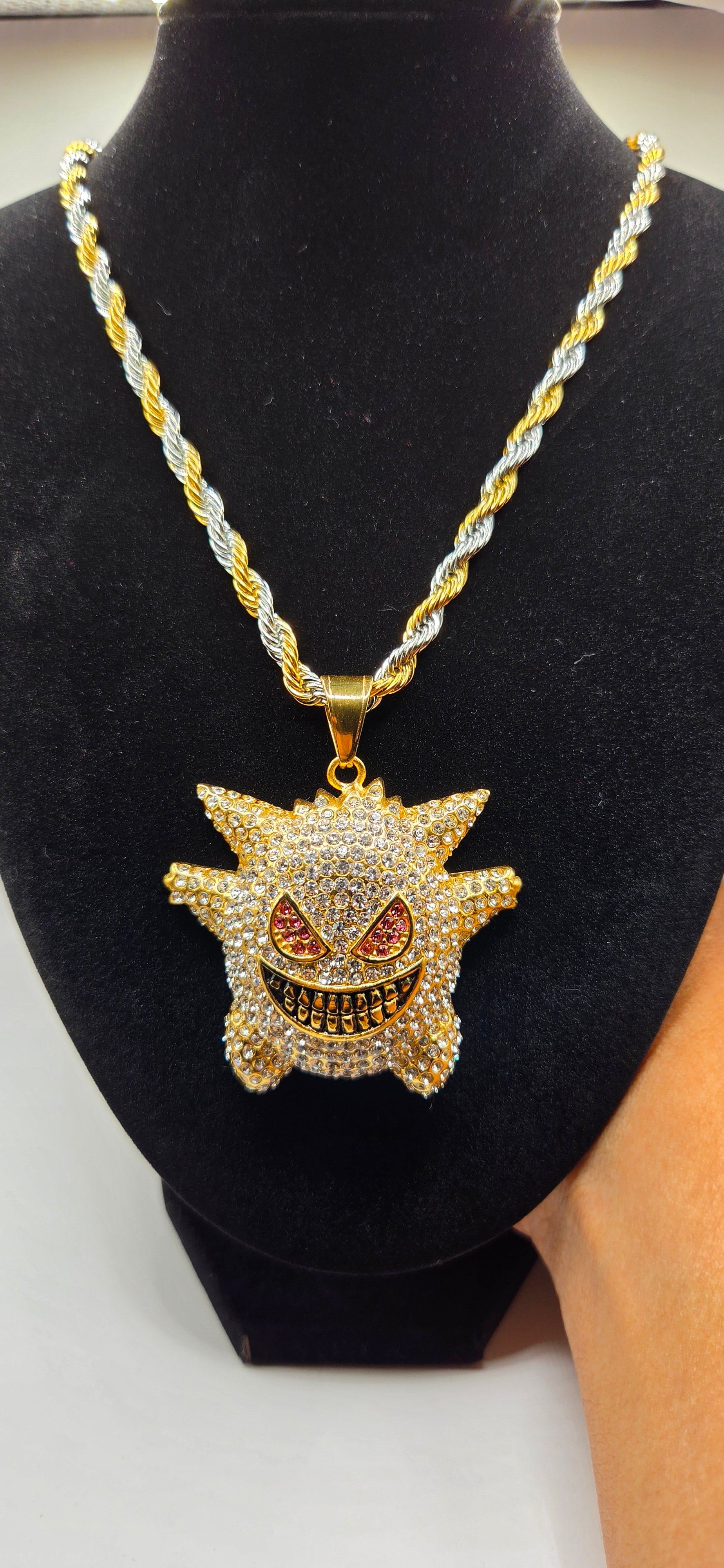Iced out Gangar pendant with 24 inch silver/gold rope chain
