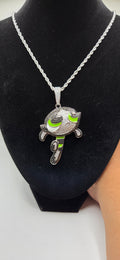Iced out buttercup power puff girl pendant on a 24 inch rope chain.