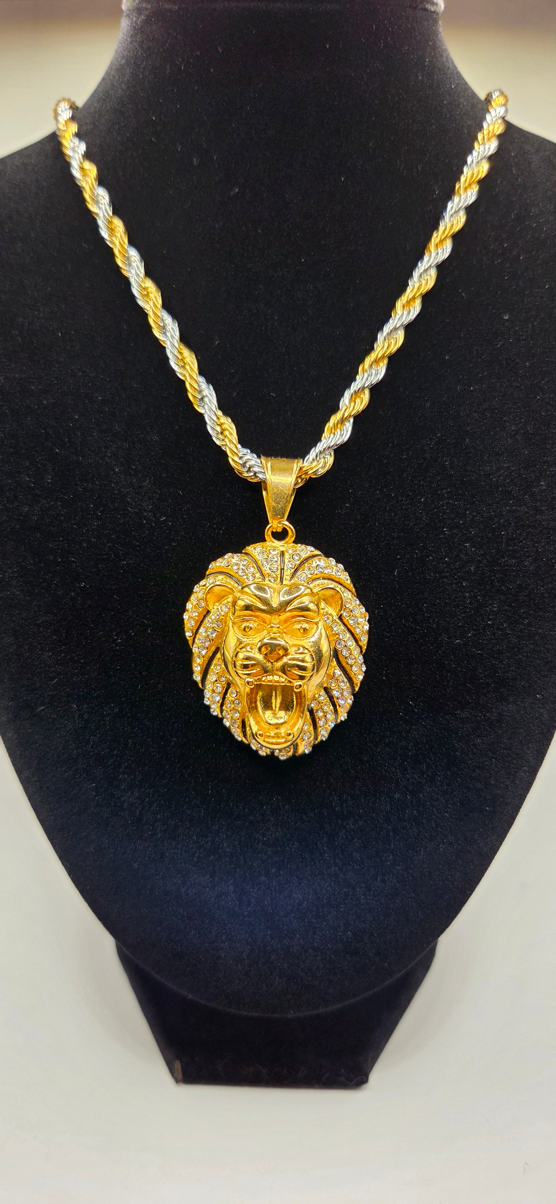 30 inch silver and gold rope twist chain with a roaring lion pendant.