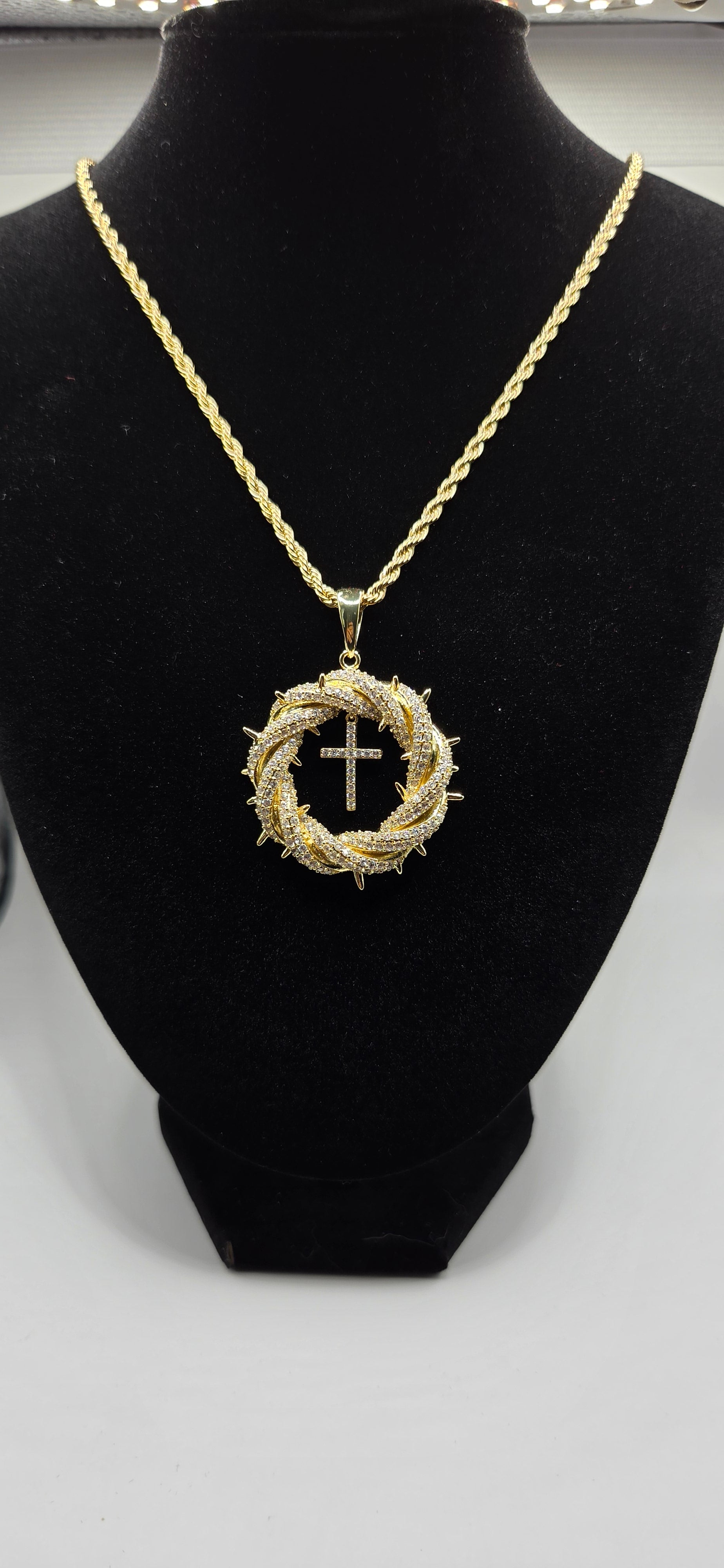 Golden colored wreath with cross
