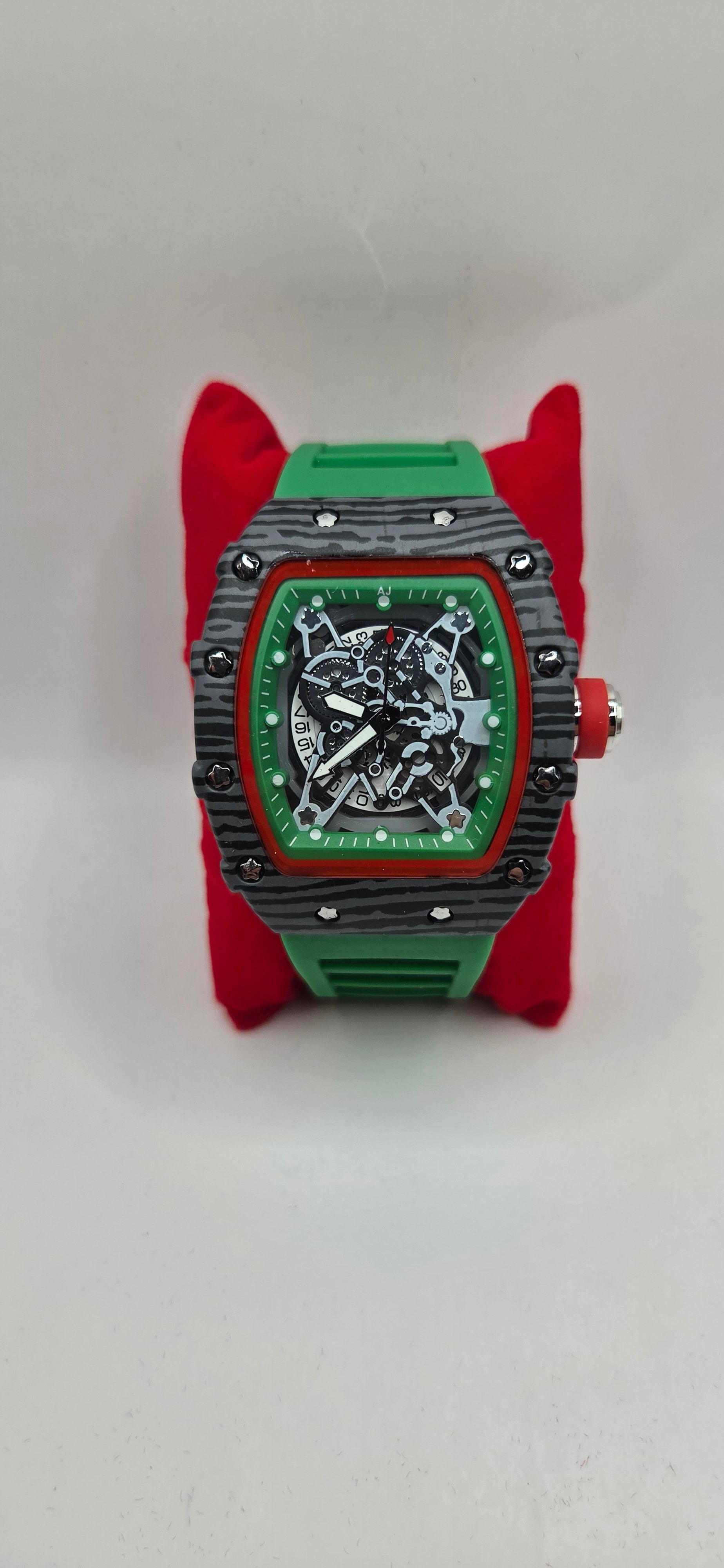 Mille style watch black carbon fiber with a green rubber band