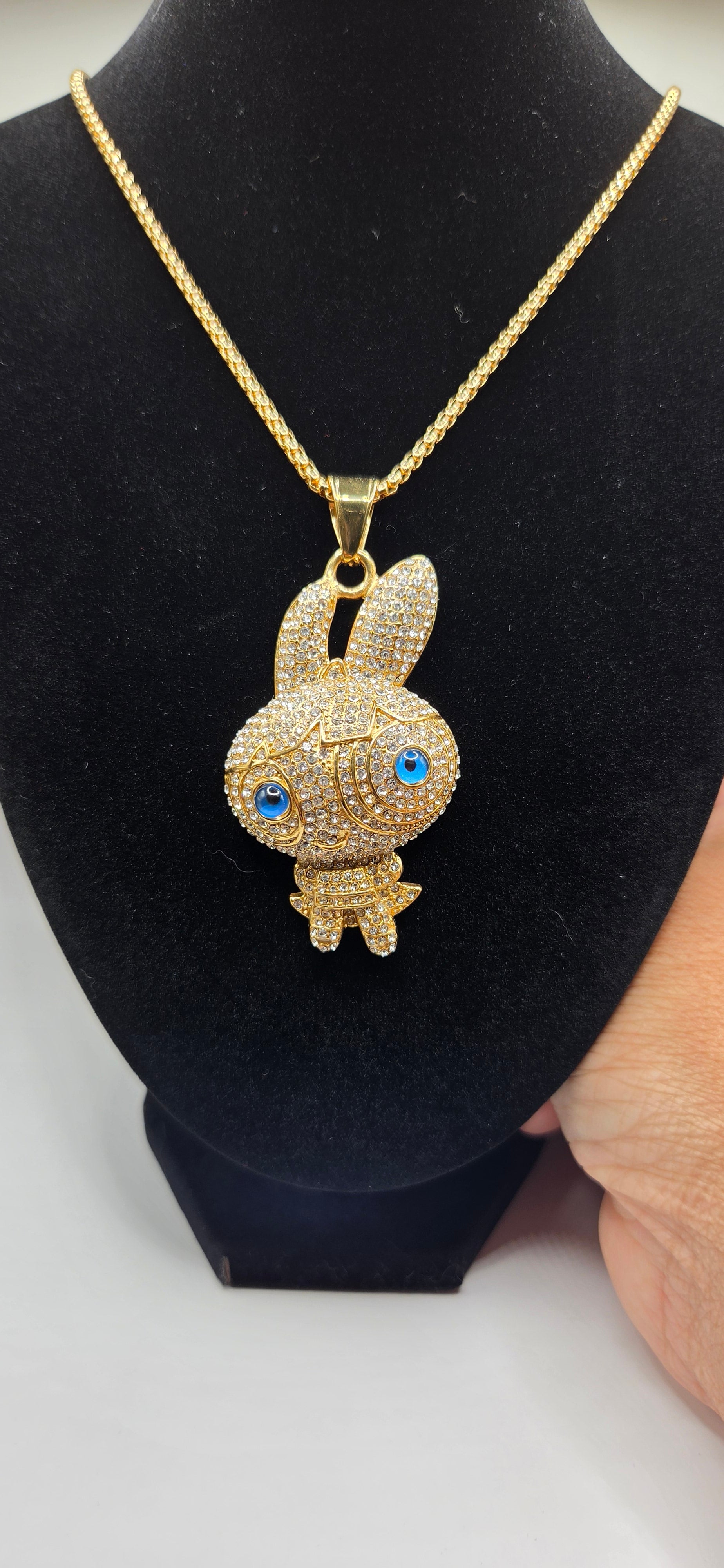 24 inch chain with a iced out blossom power puff girl pendant