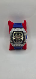 Iced out Mille style watch silver with a blue rubber band