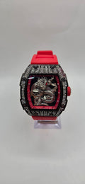 Aj iced out mille style watch with a red rubber band and VVSCZ stones