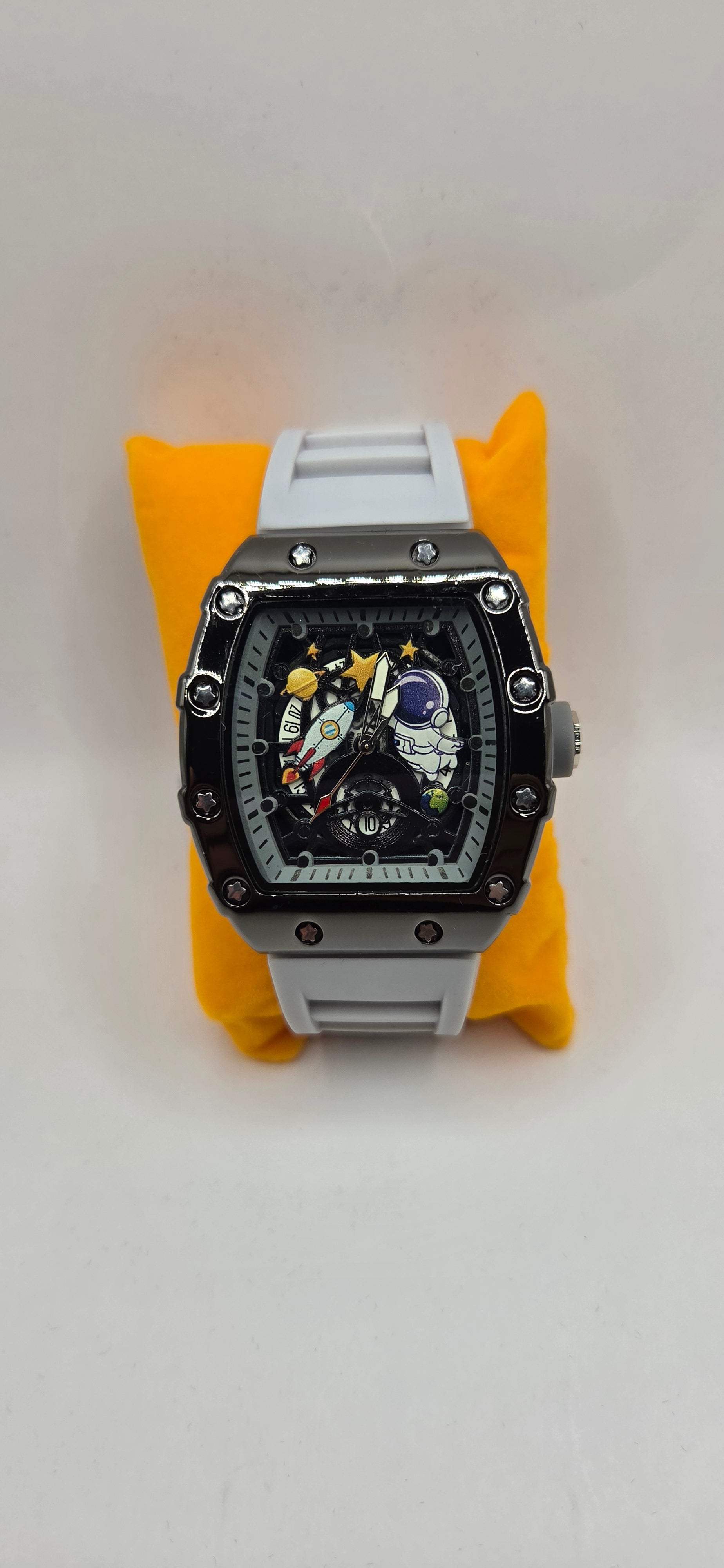 AJ Mille style astronaut watch ith a black with light gray rubber band