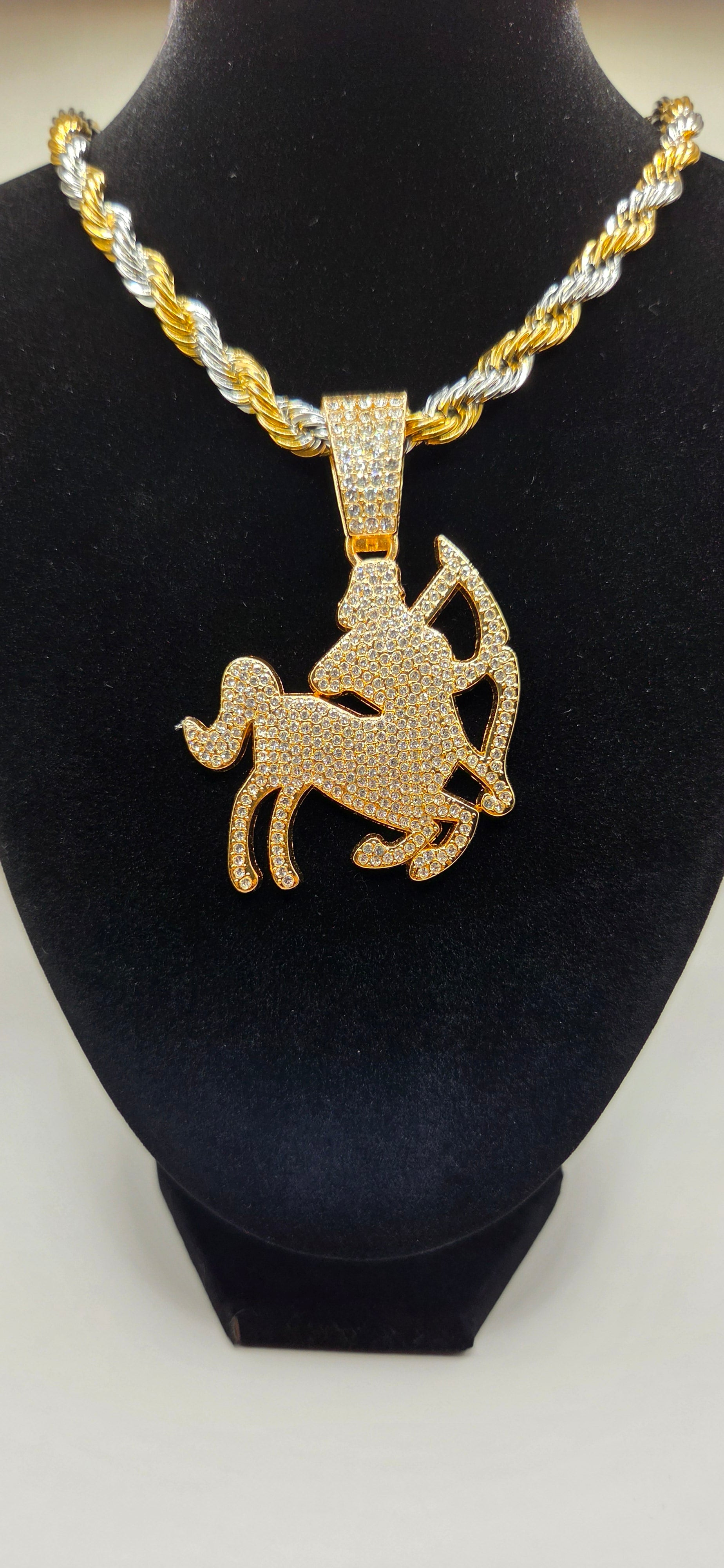30 inch silver, gold rope chain with out centaur pendant