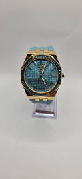 AJ AP gold on Tiffany blue crystal watch.