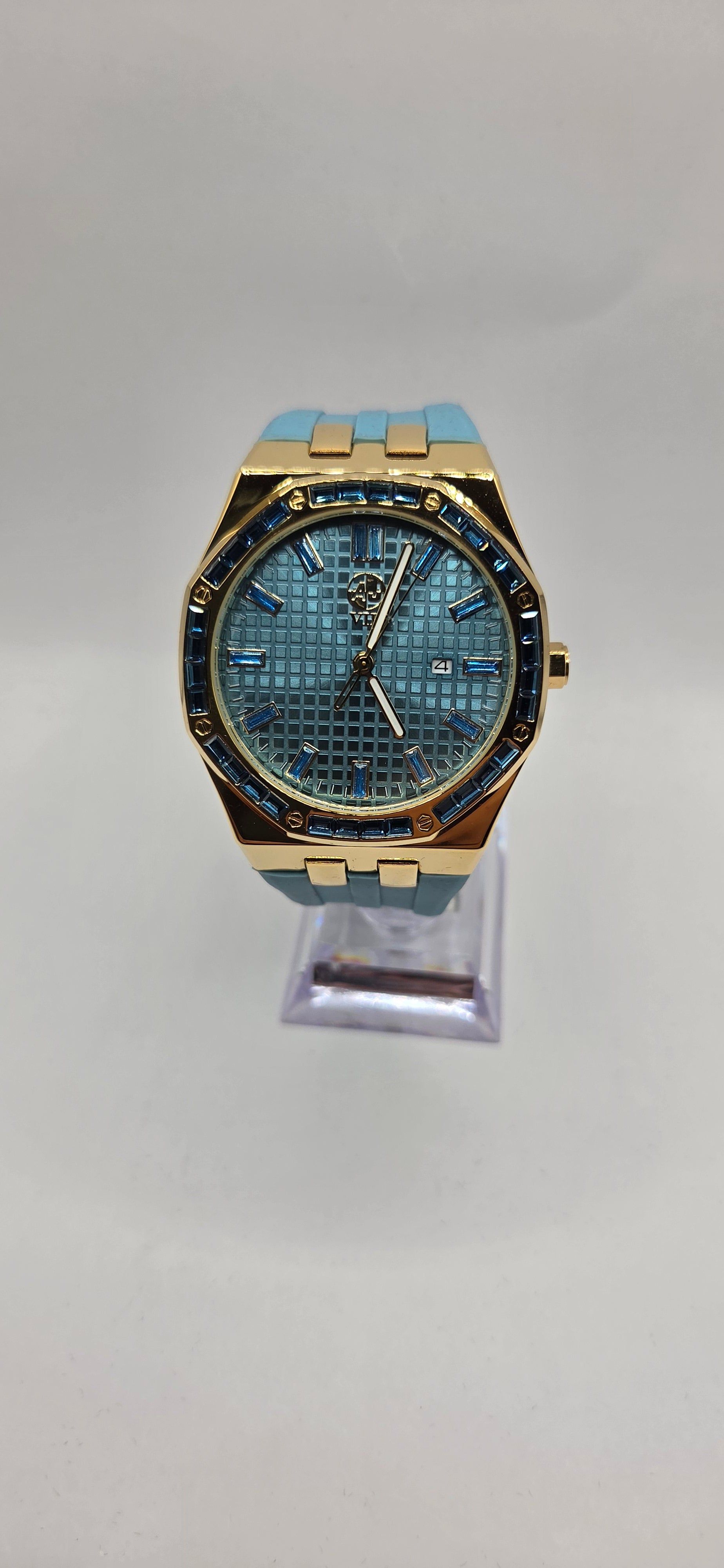 AJ AP gold on Tiffany blue crystal watch.