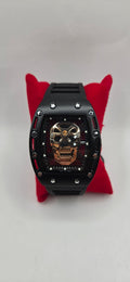 AJ Mille style skeleton watch rose gold with a black/black rubber band see through back